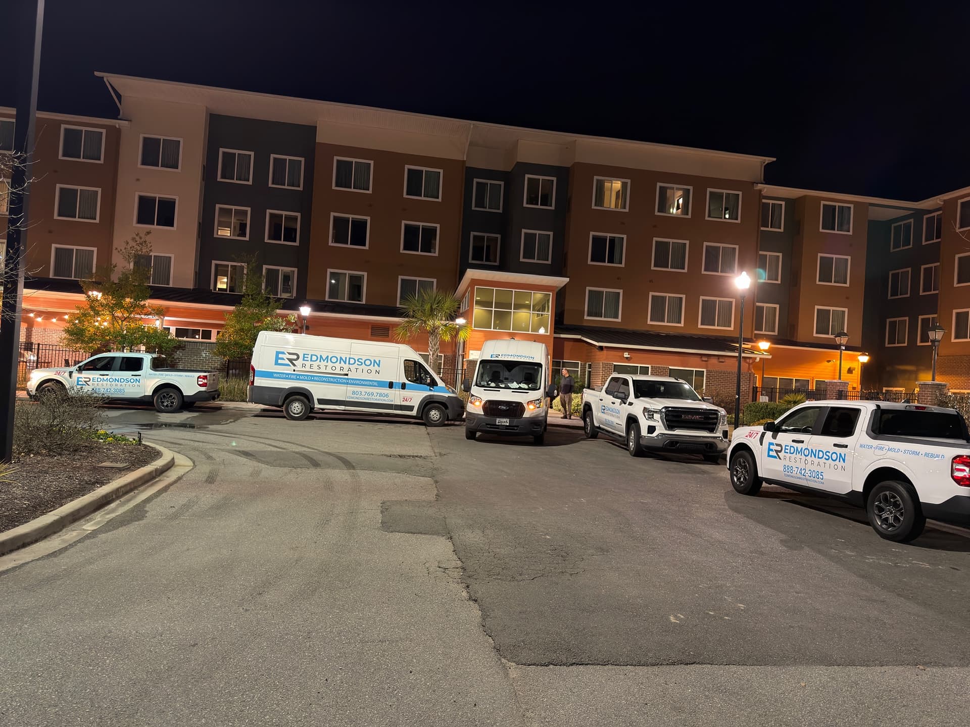 Edmondson Restoration service trucks deployed at hotel restoration job